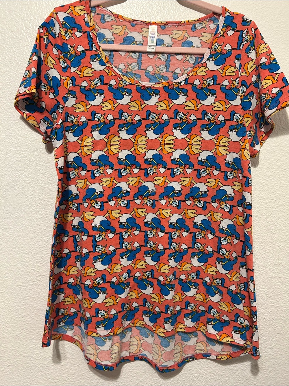 LuLaRoe Coral Scoop Neck Tee with Donald Duck Allover Print